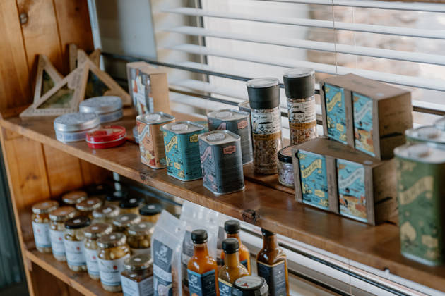 Canned and bottled goods display stand