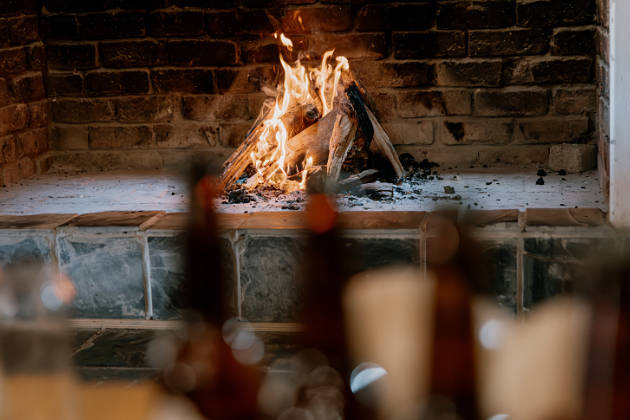 Fire burning in fireplace at restaurant